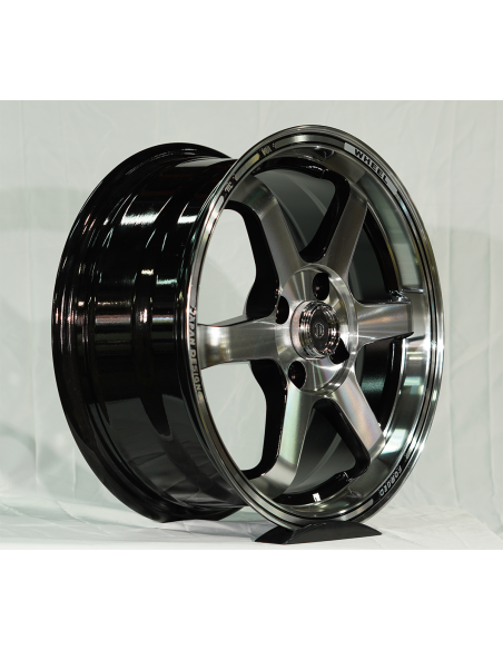 Juego de 4 llantas  15*6.5	et 40. 4*100	cb 73.1	BLACK MACHINE FACE
