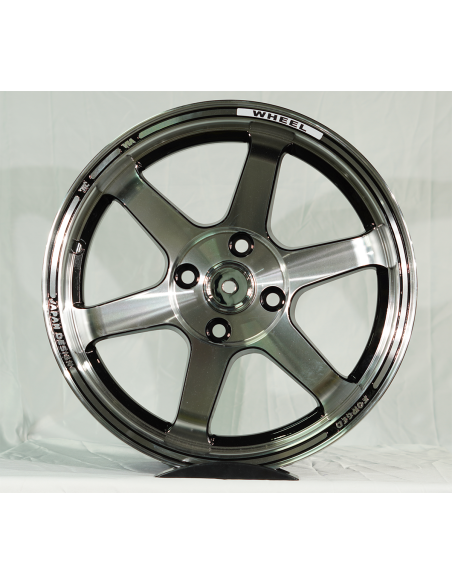 Juego de 4 llantas  15*6.5	et 40. 4*100	cb 73.1	BLACK MACHINE FACE